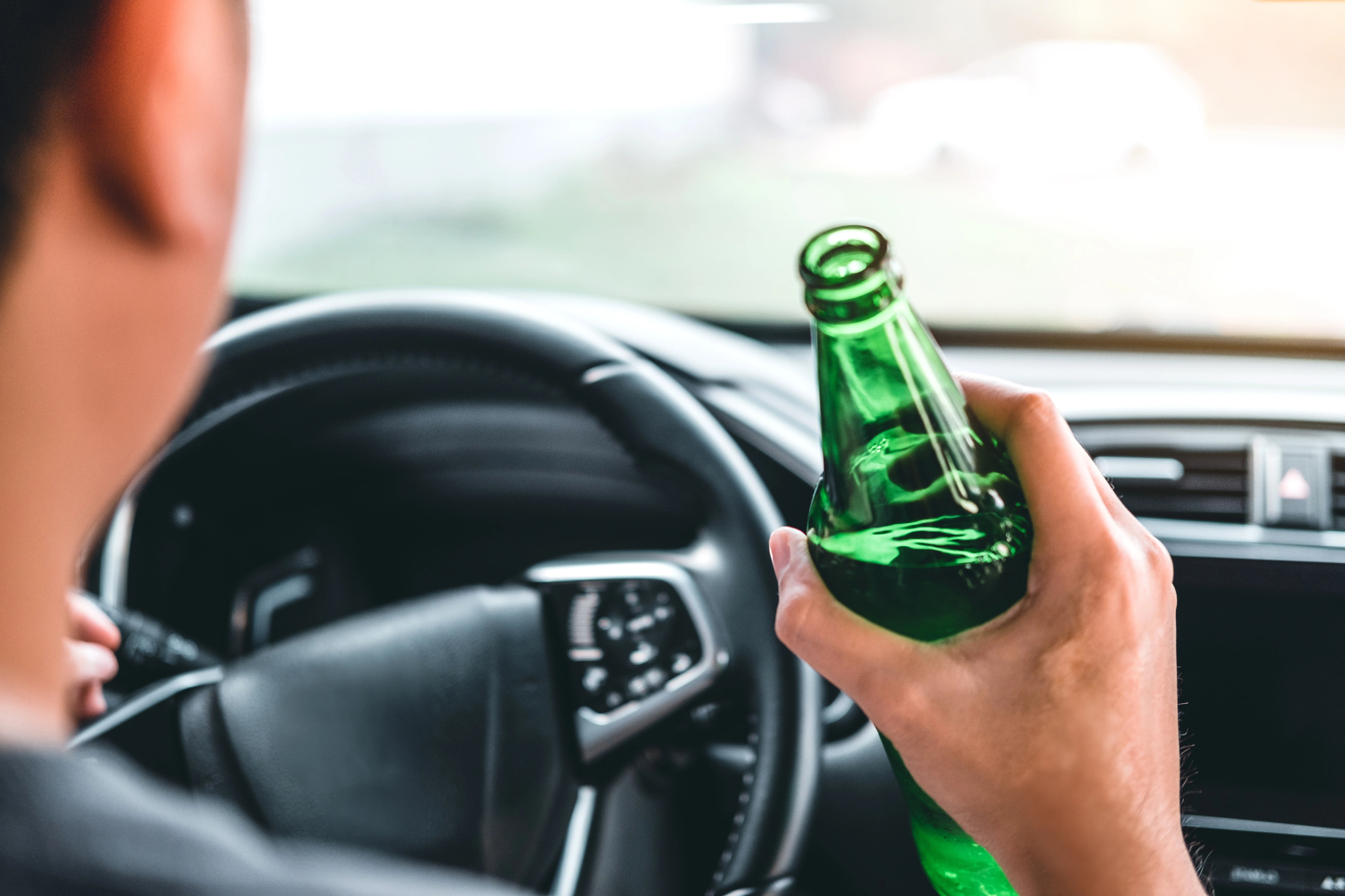 Picture of Driver with beer in hand